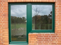 Terrassentür mit Bockfenster im Farbton Moosgrün